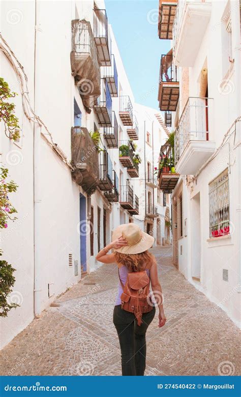 Backview of Woman Walking in Spanish Street Stock Photo - Image of ...