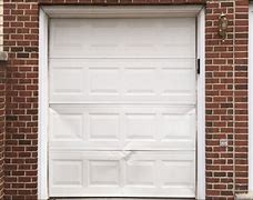 Image result for Fixing Dented Garage Door