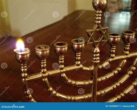 First Night of Chanukah, the First Candle of the Menorah Stock Image ...
