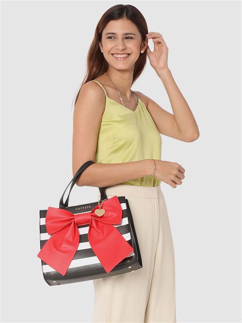 Buy Caprese Emily In Paris Printed With Bow Satchel Handbag Red @ Rs ...