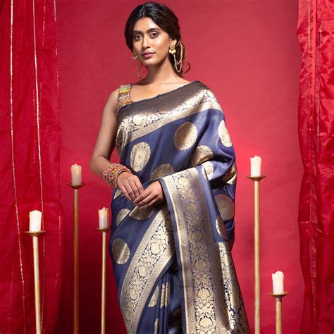Bangalore silk saree in navy blue color with zari chakra motifs and bo ...