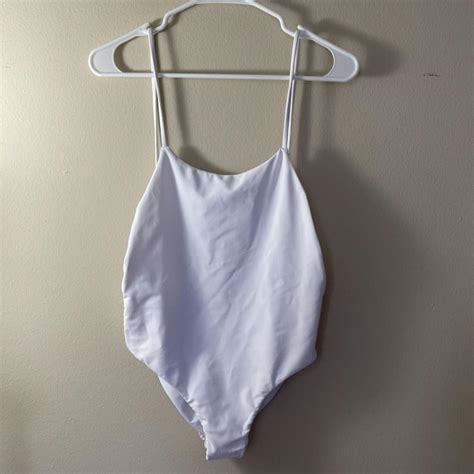 White one-piece swimsuit — size Medium Brand is... - Depop