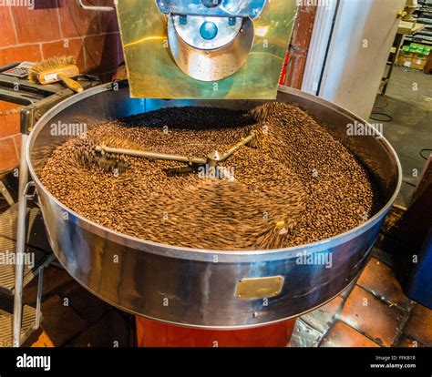A close-up of a coffee bean roasting machine at Santa Barbara Roasting ...
