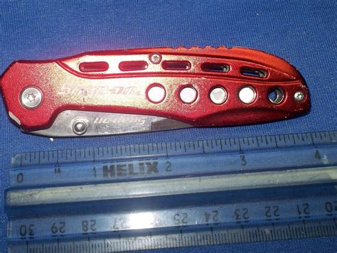 Red snap on pocket knife | #1918626508