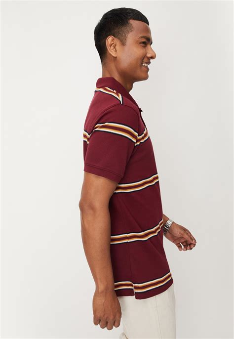 Buy Men Striped Slim Fit Polo T-shirt Online at just Rs. 699.0 ...