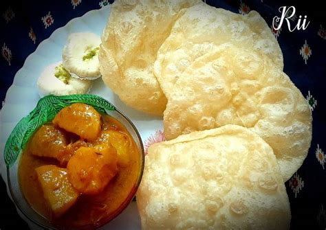 Loochi(Puri) with potol ER dalna(pointed gourd curry) Recipe by Susita ...