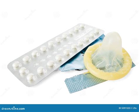 Birth Control Pills and a Condom Stock Image - Image of cutout, latex ...