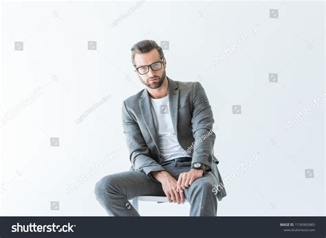Suit Man Sitting 的图像结果
