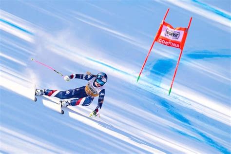 United States' Lindsey Vonn crashes into a gate during an alpine ski women's downhill race, at the 2026 Winter Olympics, in Cortina d'Ampezzo, Italy, Sunday, Feb. 8, 2026. (AP Photo/Jacquelyn Martin)