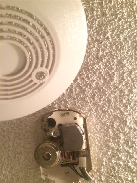 What should I do about this smoke detector that beeps constantly ...