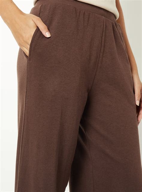 Buy Women Solid Athleisure Track Pants Online at just Rs. 699.0 ...