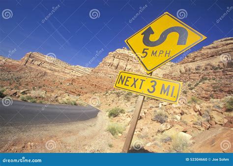 Windy road sign stock photo. Image of directional, color - 52304660
