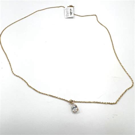 14K yellow gold necklace with a beautiful white stone pendant
