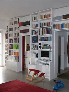 libreria con porta scorrevole arredamento su misura roncoroni legno libreria con porta scorrevole arredamento su misura roncoroni legno