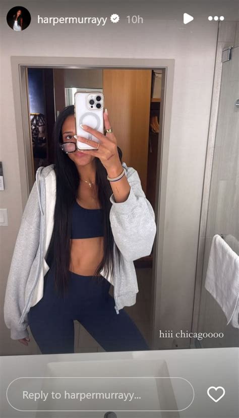 Nebraska Volleyball's Harper Murray poses in blue gym fit in mirror selfie