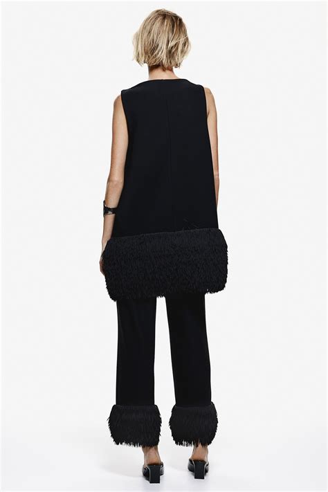 Pantalón con bajo de flecos - Negro - MUJER | H&M ES