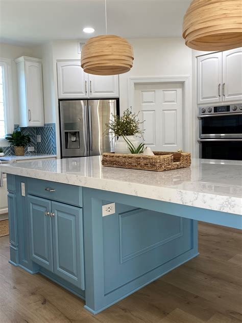 Labrador Blue kitchen island. Bamboo pendants. White Quartz Countertops ...