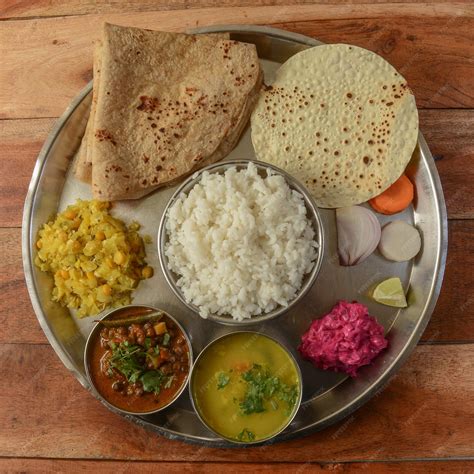 Premium Photo | Veg thali from an indian cuisine food platter consists ...