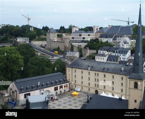Houses roof and cathedral tower in capital of LUXEMBOURG, historic part of city, largest in ...