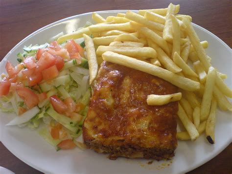 Lasagne, chips and salad   Embassy cafe. The chips were  