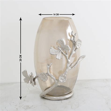 Buy Splendid Buttefly Embossed Vase from Home Centre at just INR 2599.0