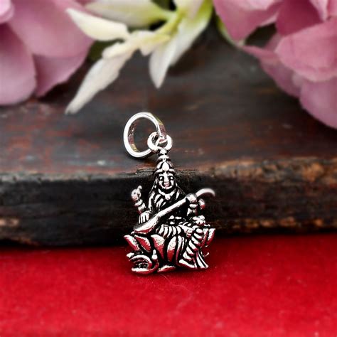 "Devi Saraswati Maa Pendant Locket in Silver - Divine Wisdom and ...
