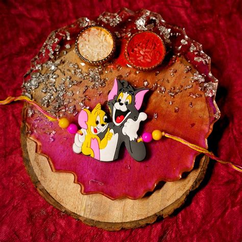 Send Playful Cartoon Rakhi Set Online