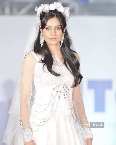 A model showcases a creation during IITC's Annual fashion show at Leela ...
