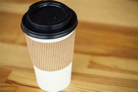 Good morning. paper cup of hot coffee | Premium Photo