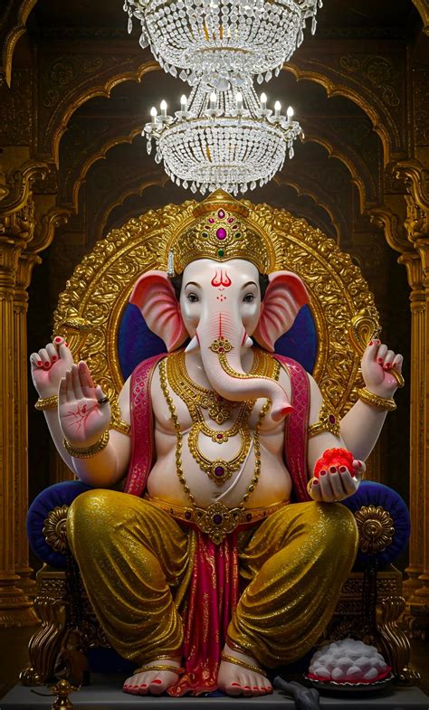 Royal Lord Ganesha Idol with Golden Ornaments - GodsPhoto
