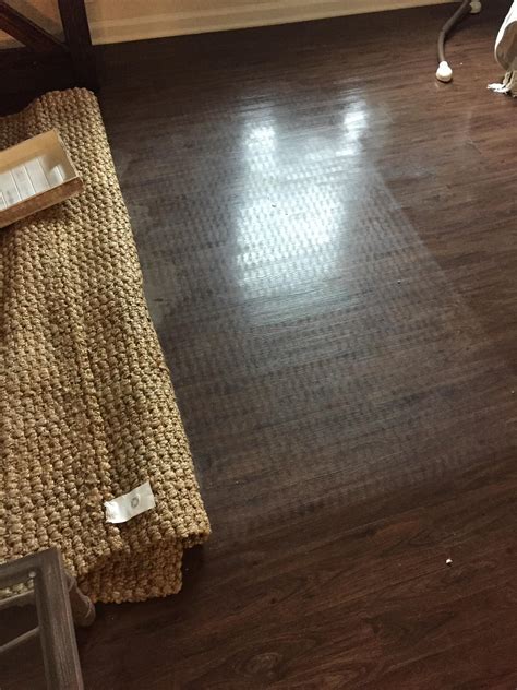 Our jute rug marred our laminate floors. Help! : r/fixit