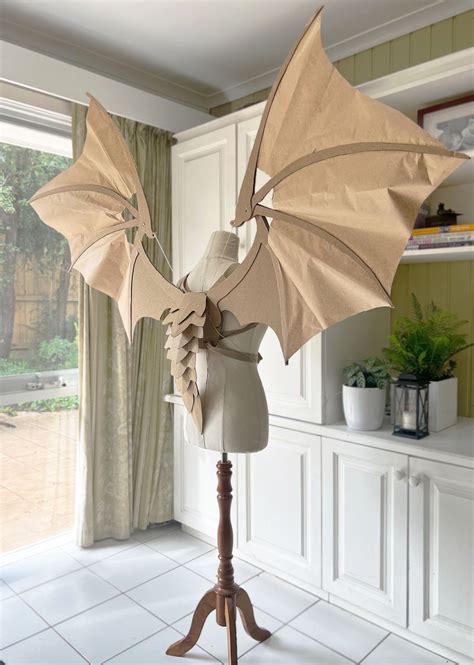 DIY CARDBOARD DRAGON WINGS COSTUME | Dragon crafts, Cardboard costume ...