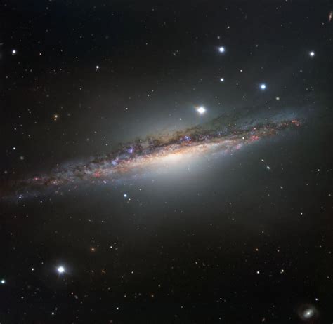 APOD: 2011 July 15 - NGC 3314: When Galaxies Overlap