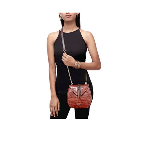 Handcrafted Leather Sling Bags & Clutches for Women: Hidesign