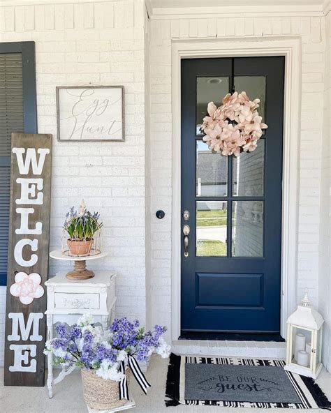 Navy Blue Exterior Door with Pale Pink Wreath - Soul & Lane