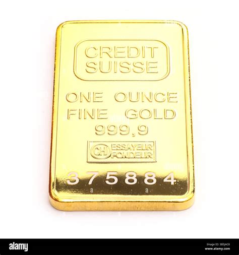 Credit Suisse one troy ounce gold bar, isolated on a white studio ...