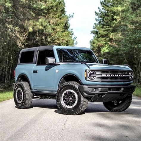 Blue Ford Bronco Parked on the Side of the Road