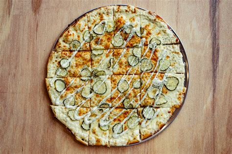 Curiouser Coffee & Conservatory - Revolve Hall