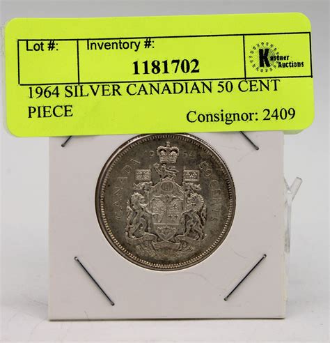 1964 SILVER CANADIAN 50 CENT PIECE