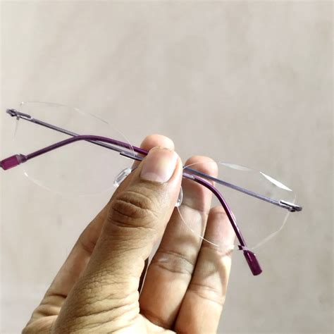 Purple Cat Eye Rimless Glasses with Diamond Cut Edges – Glasses India ...