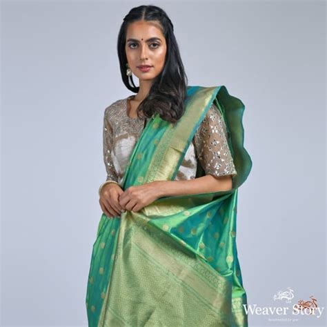 Forest Green katan silk saree with asharfi booti – WeaverStory