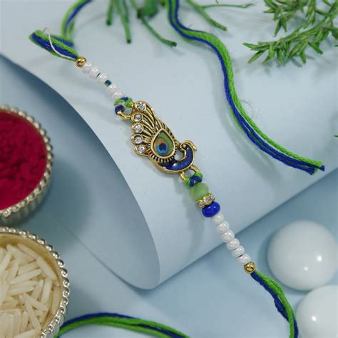 Krishna Mor Pankh Rakhi with Roli Chawal & Rakshabhandan Card