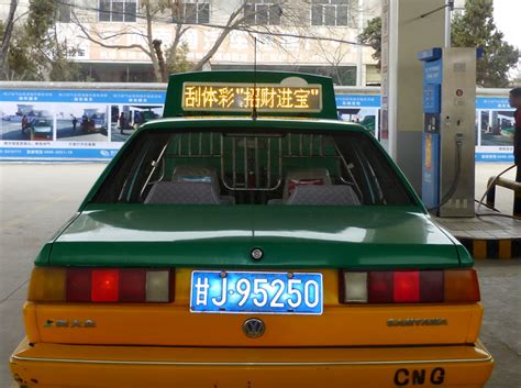 新能源“围城”：广州出租车实行电动化_续航
