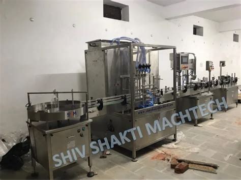 Image result for Oil Bottle Packing Machine