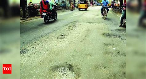Road laid just two days ago damaged in rain | Madurai News - Times of India