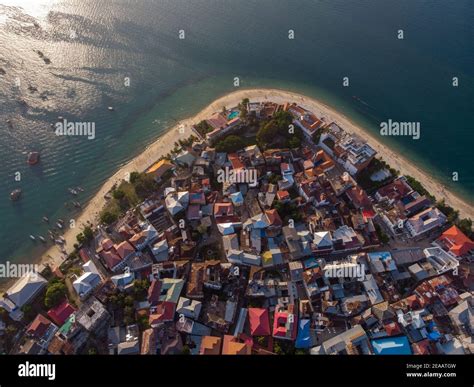 Very High Above Aerial Top View Shot of Stone Town, the Capital of Zanzibar, Tanzania. Sunset ...