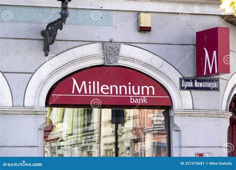 Storefront of Millennium Bank Providing Financial Services with a Banner in Torun, Poland ...