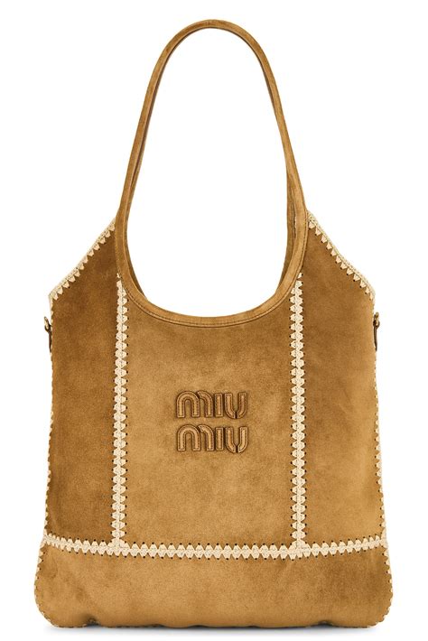 Miu Miu | Summer 2025 Collection | FWRD