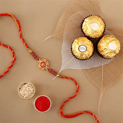 Send Sneh Holy Om Rakhi & Ferrero Rocher Online - RKH22-107125 | Giftalove