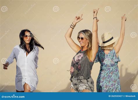 Young Spanish Girls Having Fun on a Sandy Beach Stock Image - Image of girls, beautiful: 262532427